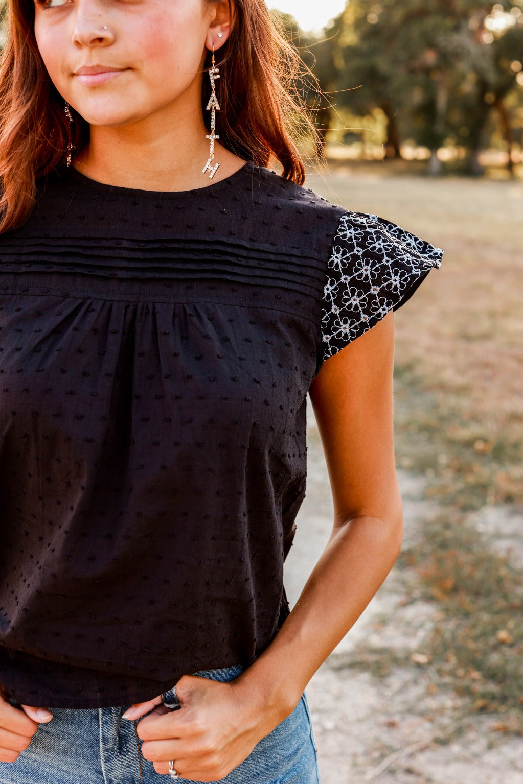 FINAL SALE - The Step Above Ruffle Top - Black