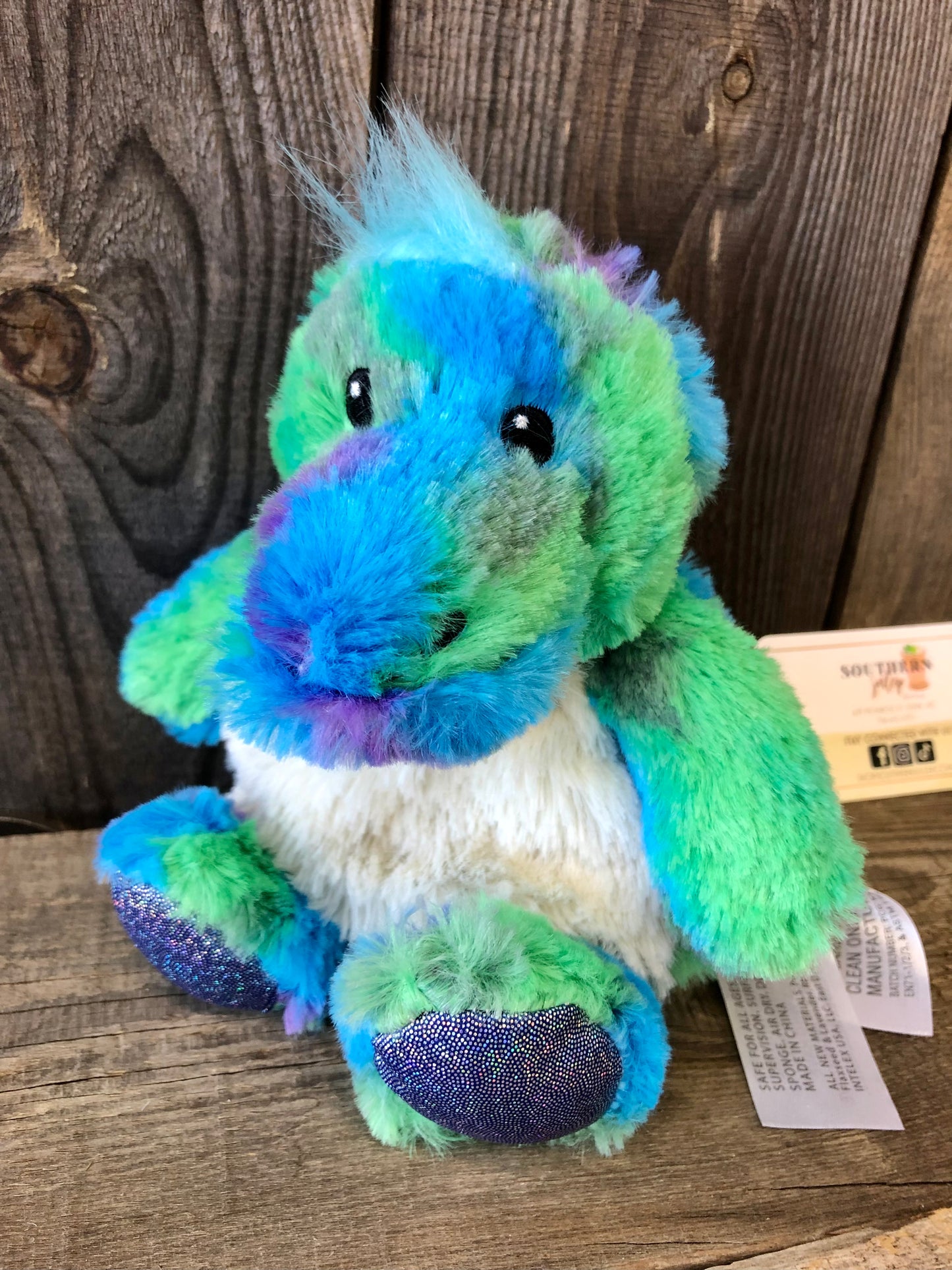 Rainbow Dinosaur Junior Warmies® Stuffed Animal